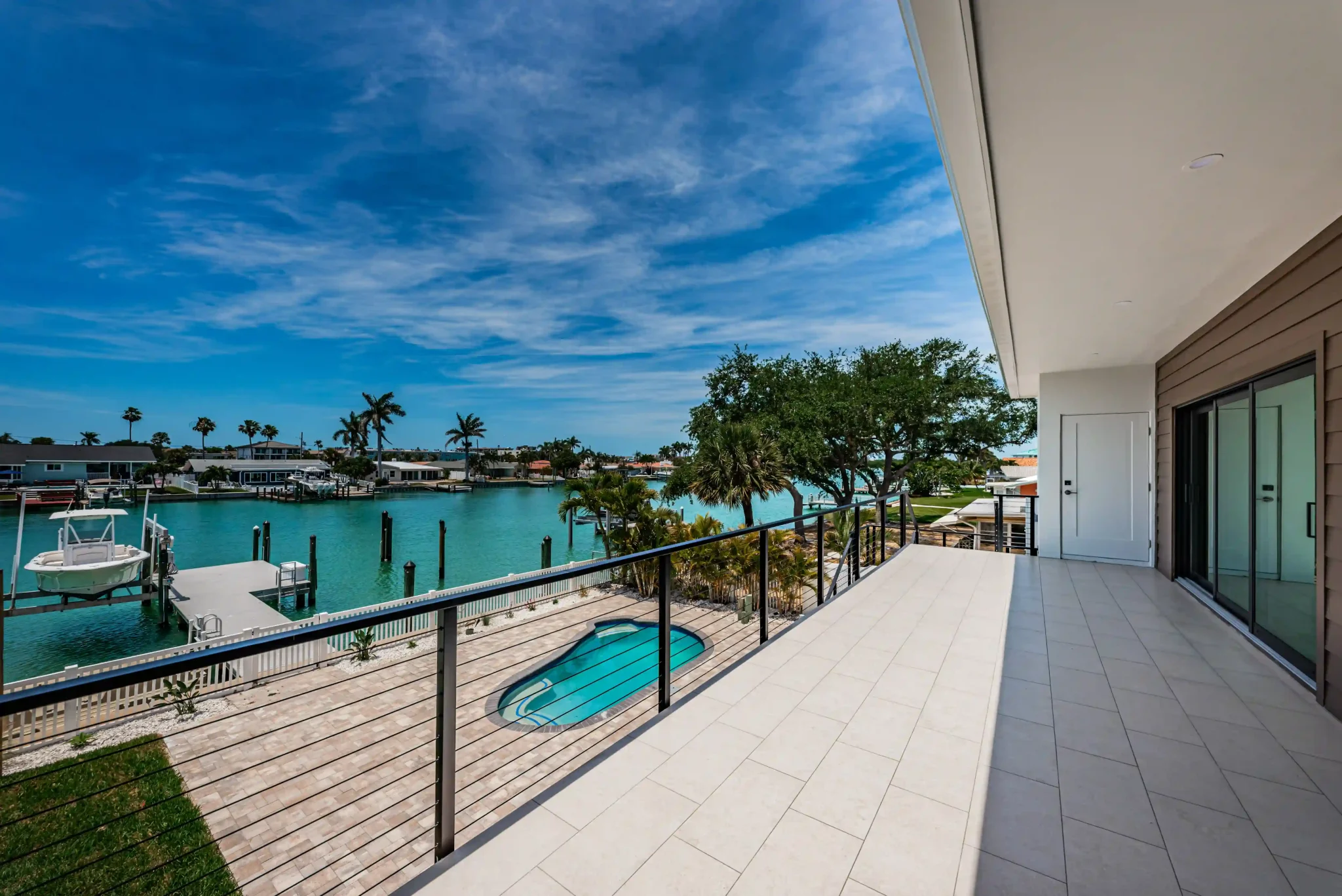 black cable railing for balcony in waterfront house