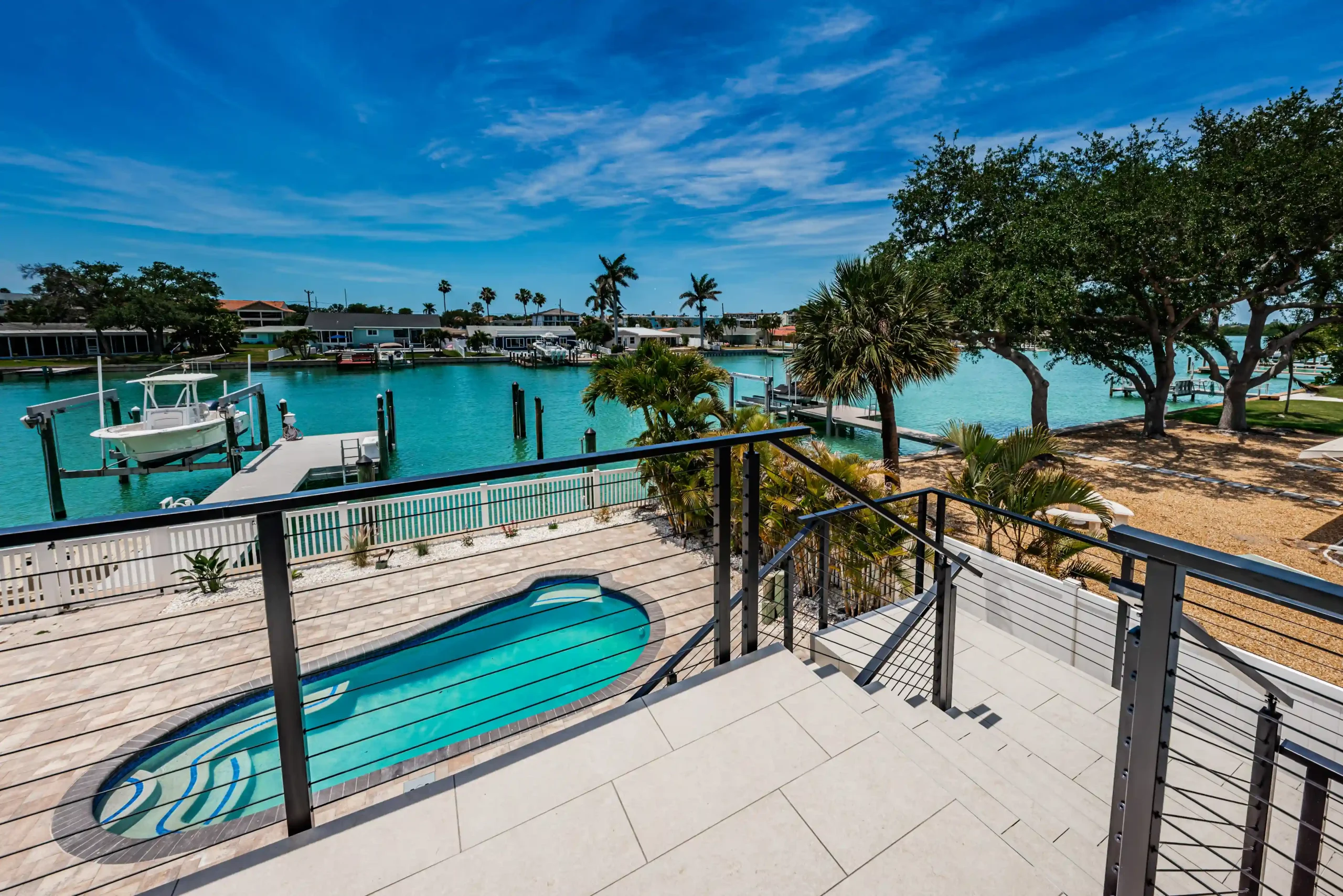Florida coastal house with black cable railing